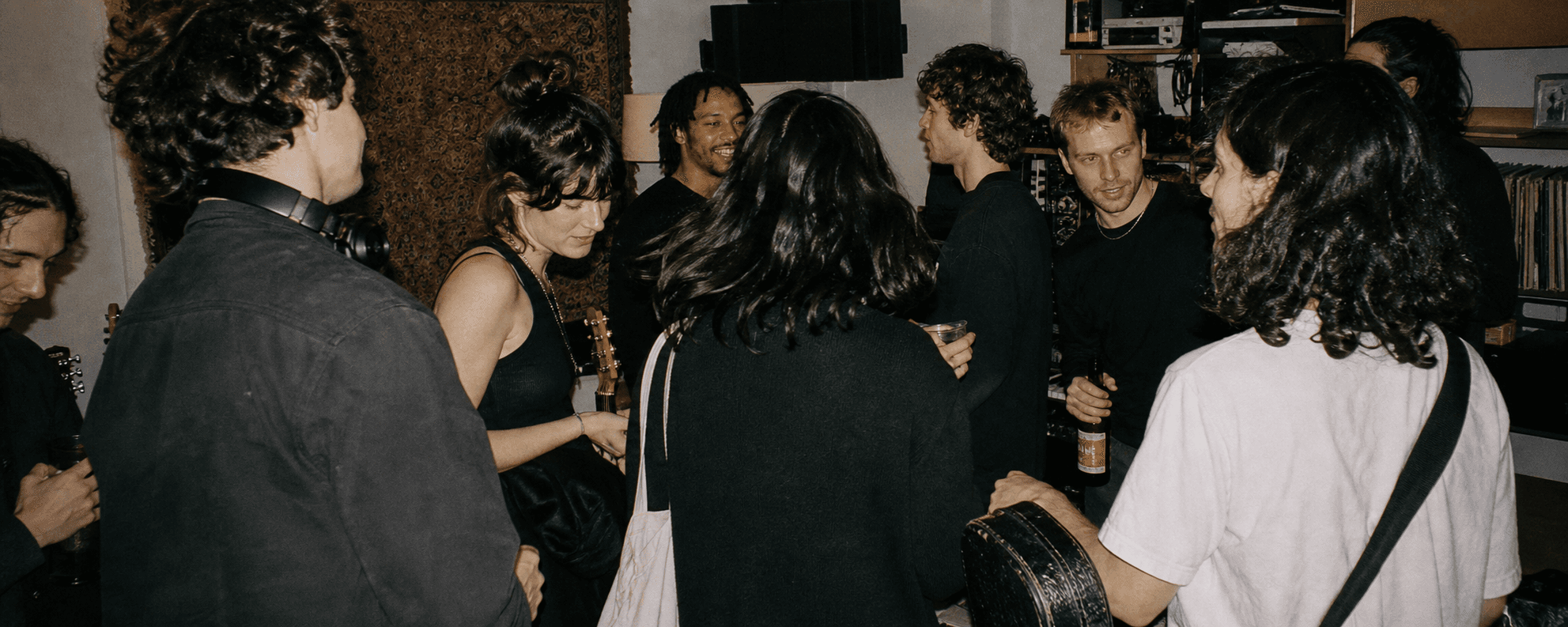 Musicians hanging out in a rehearsal room